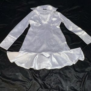 Glamorous white ruffle hem dress never worn.